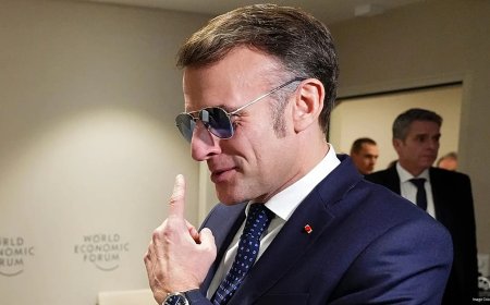 Trump mocks Macron's aviators in Davos address amid growing war of words