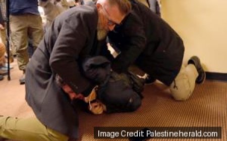 Man tackled to ground after spraying unknown substance on Rep. Ilhan Omar at Minneapolis town hall