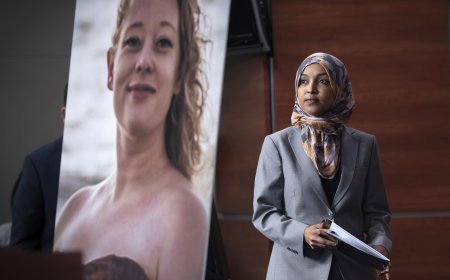 Man tackled to ground after spraying unknown substance on Rep. Ilhan Omar at Minneapolis town hall