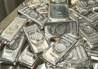 Silver resumes its slide, plunging 11%, after short-lived rebound